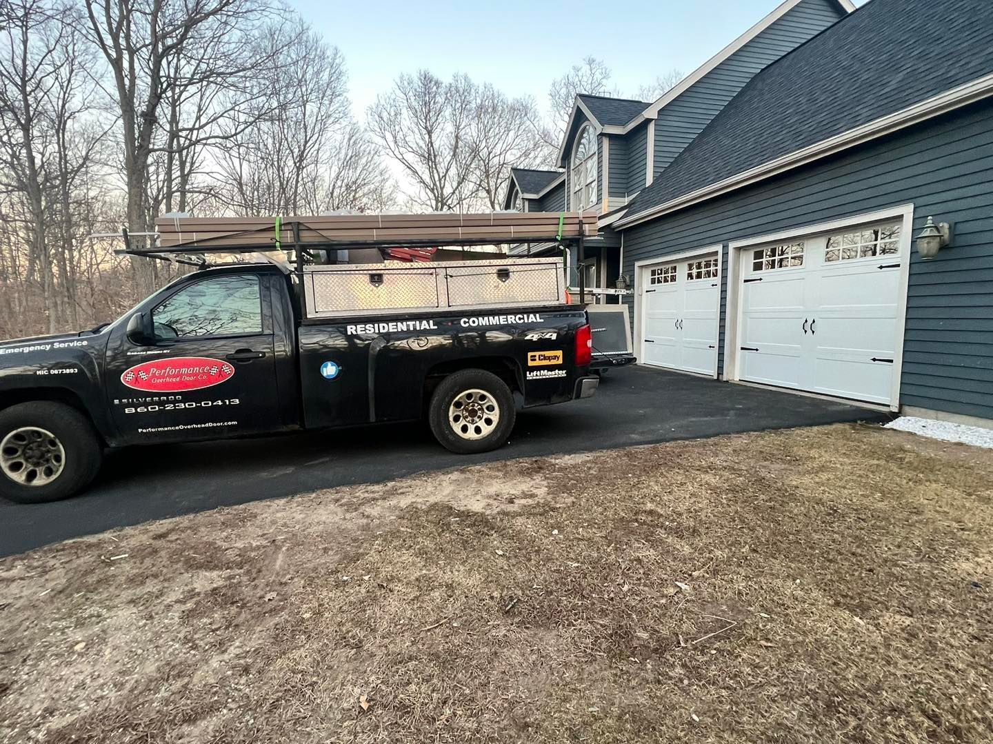 Truck In Front Of A Garage Door