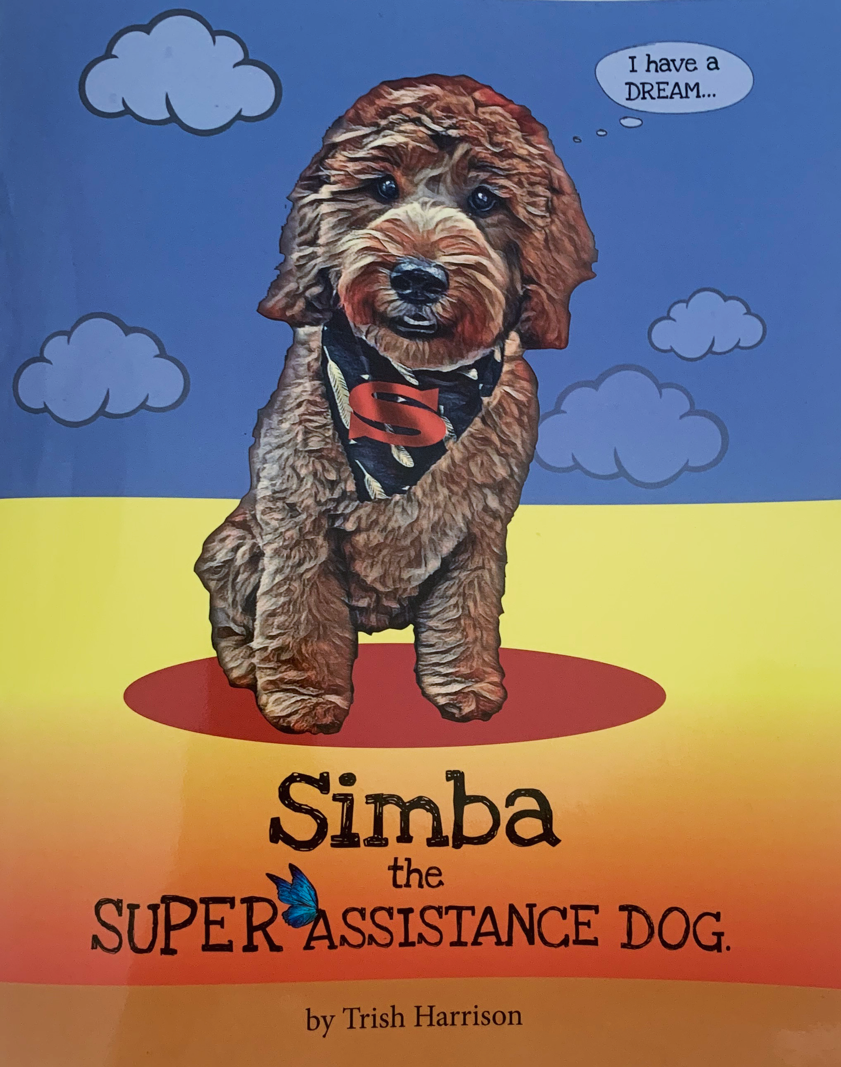 A book titled simba the super assistance dog