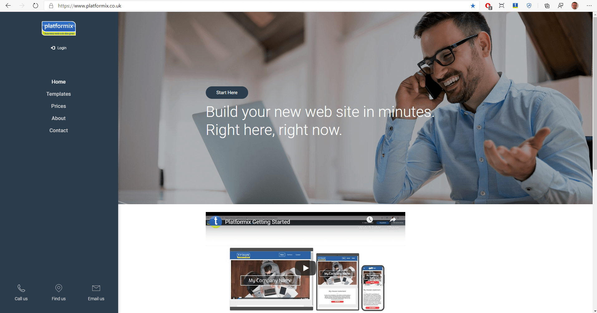 A man is talking on a cell phone while sitting in front of a laptop computer.