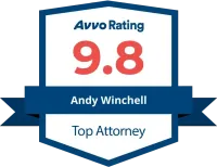 A badge that says avvo rating 9.8 andy winchell top attorney.