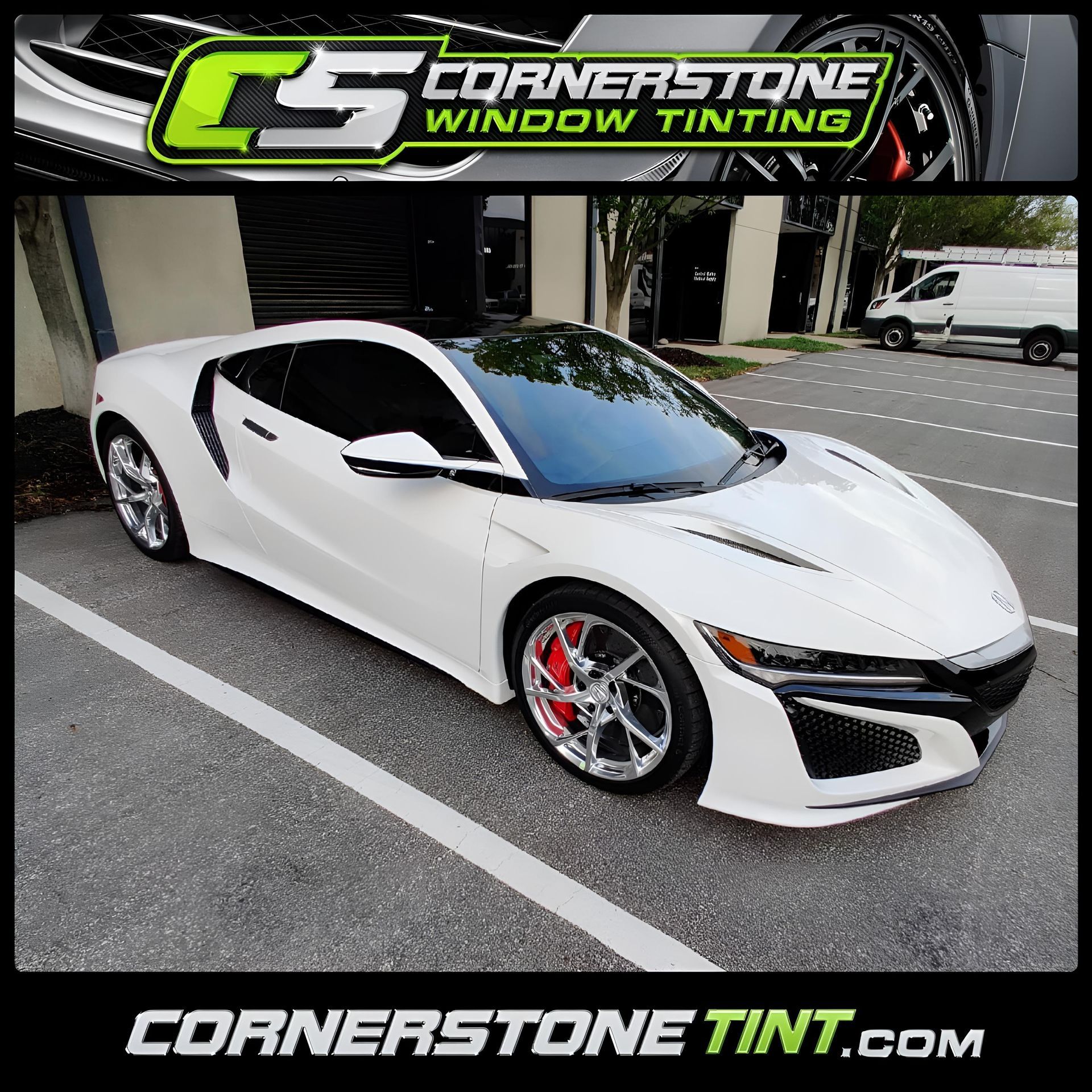 A white sports car is parked in a parking lot.