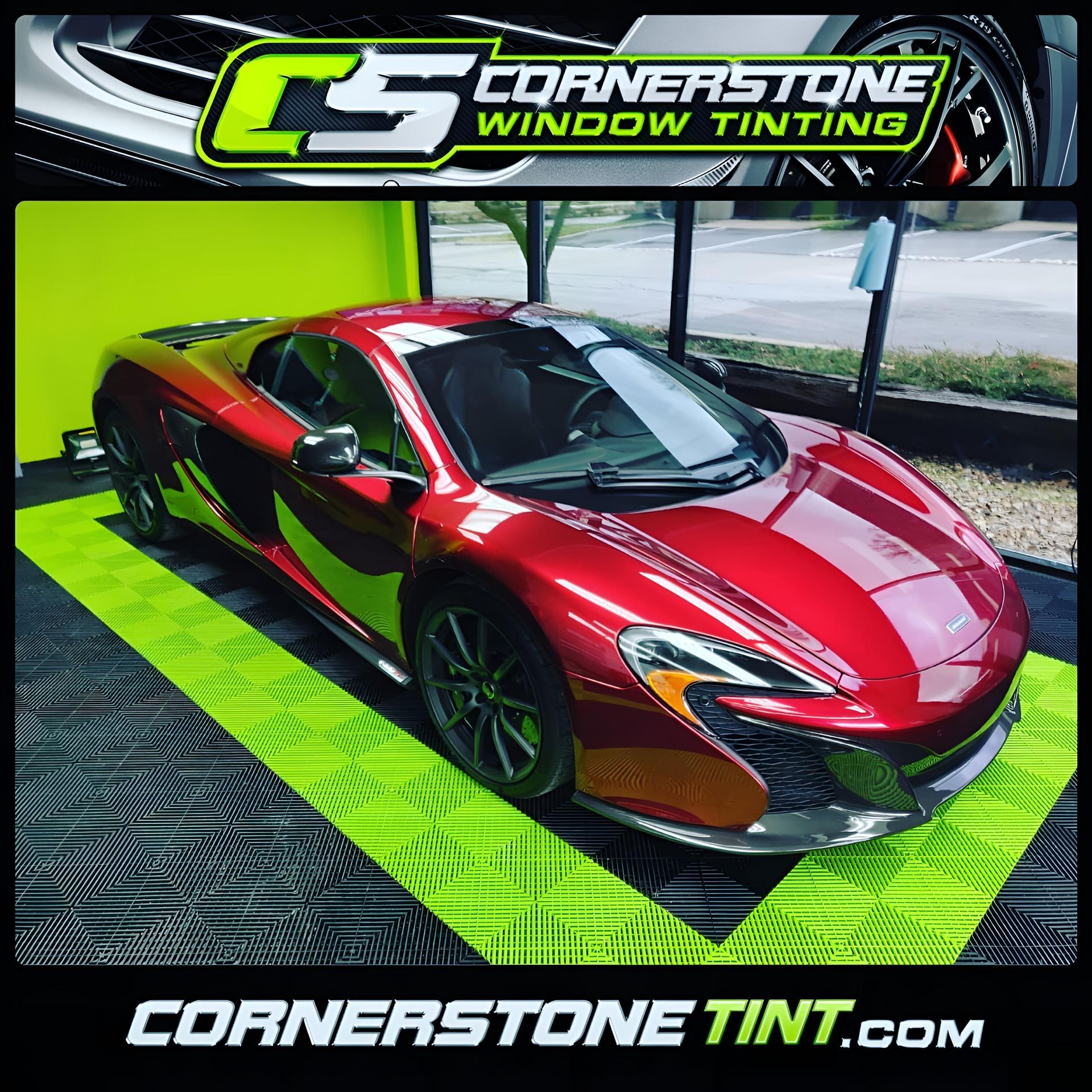 A red sports car with cornerstone window tinting written on it