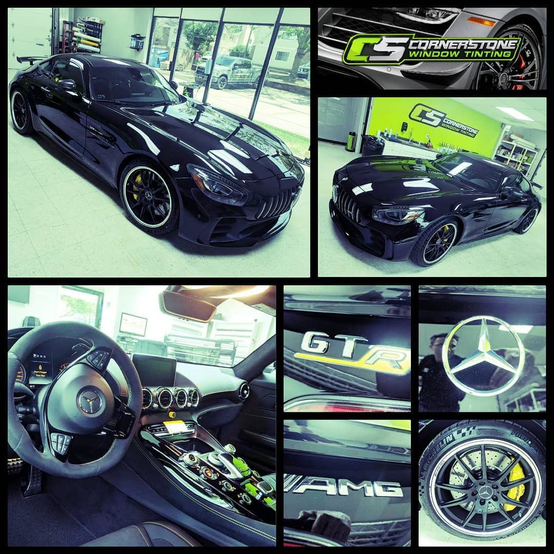A collage of photos of a black mercedes amg