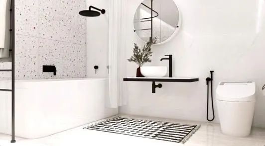A bathroom with a sink , toilet , shower and bathtub.
