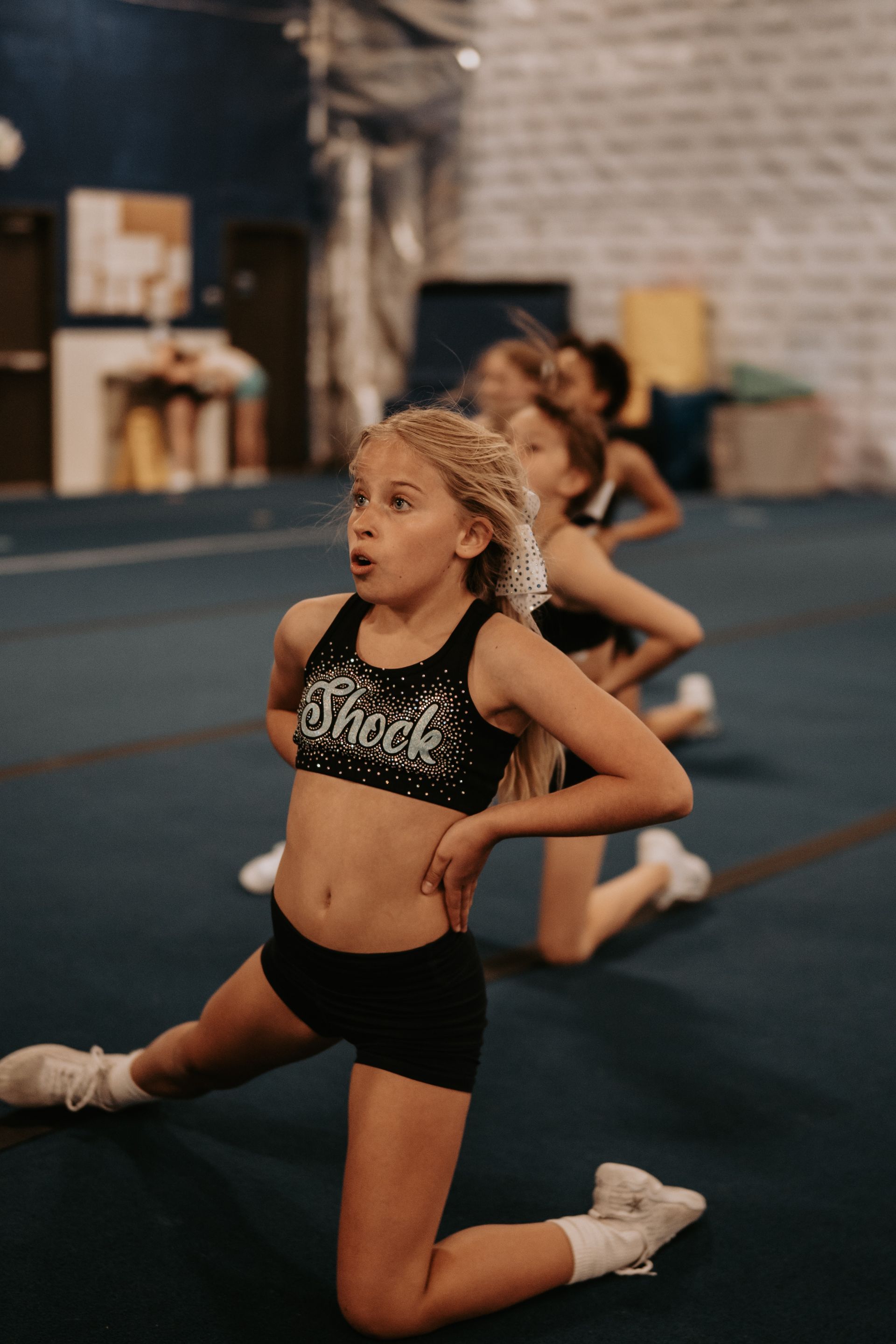 A young cheerleader at Momentum Athletic Center