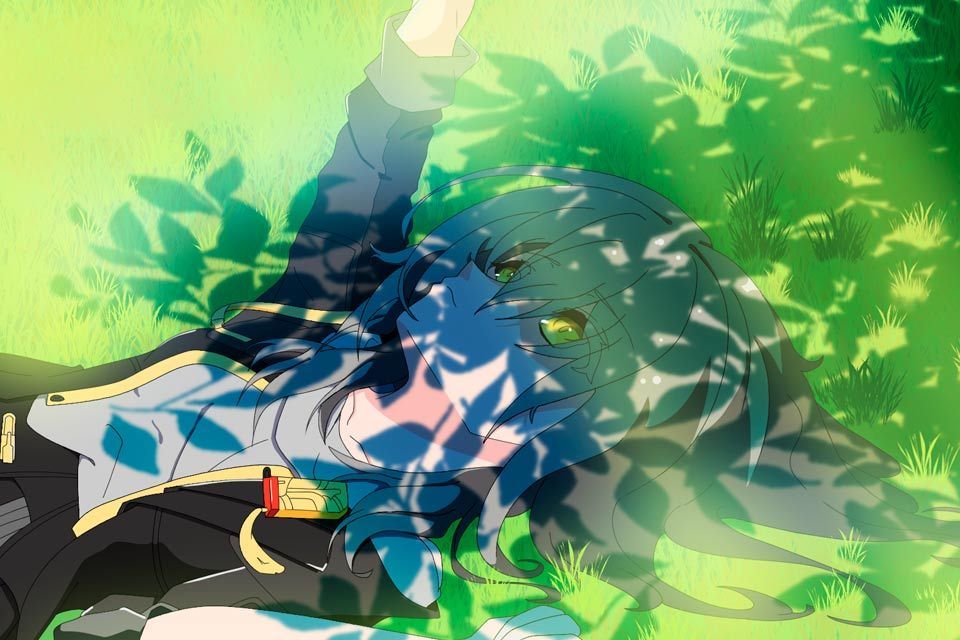 A person is laying in the grass with their head in the grass.