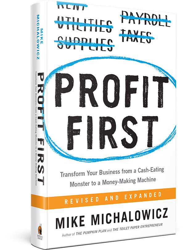 A book titled profit first by mike michalowicz