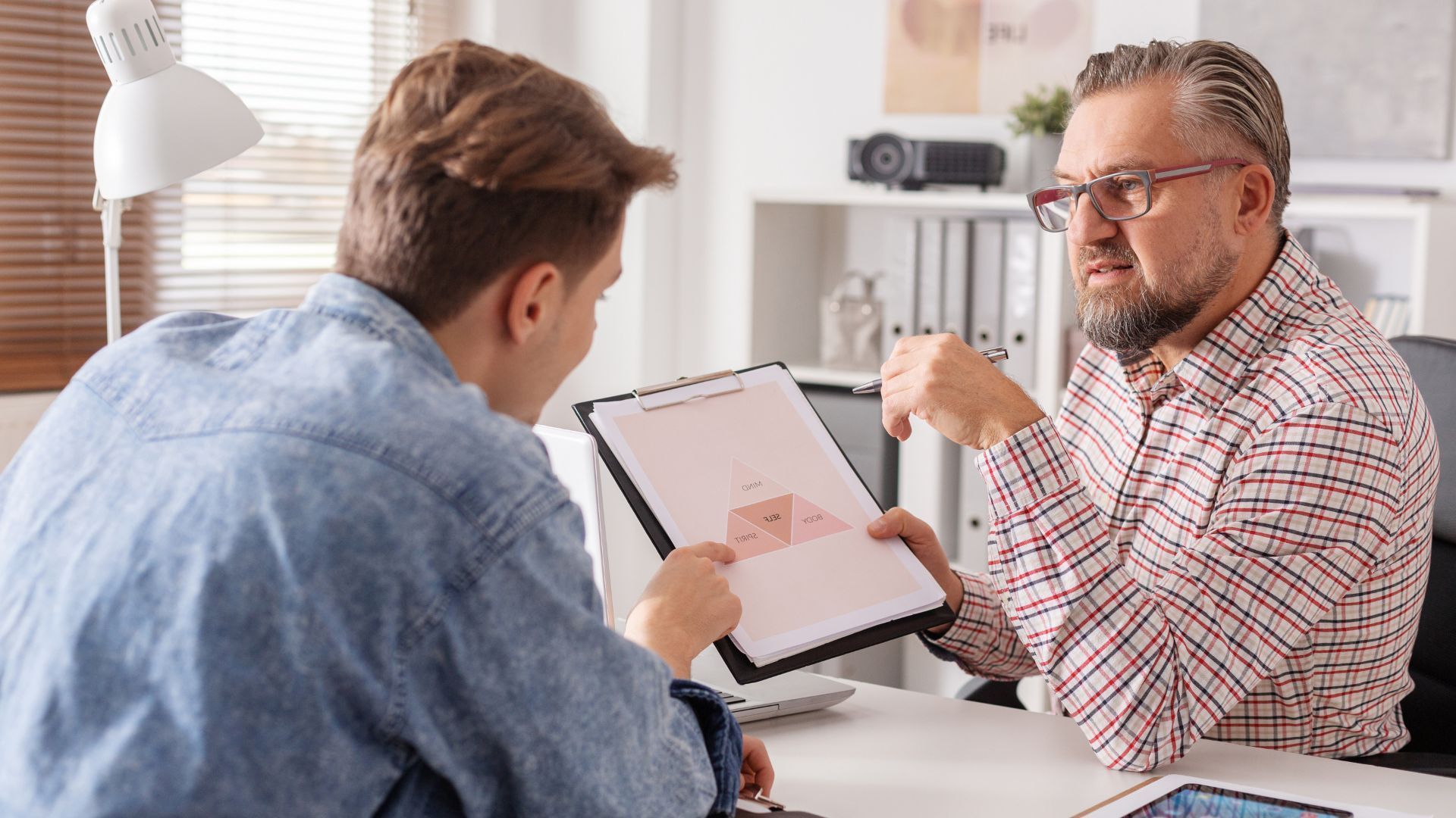 A man explaining the plan