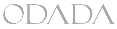 The word odada is written in gray letters on a white background.