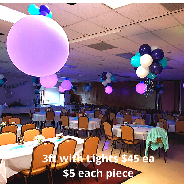 Giant Lit Globes and Topiaries