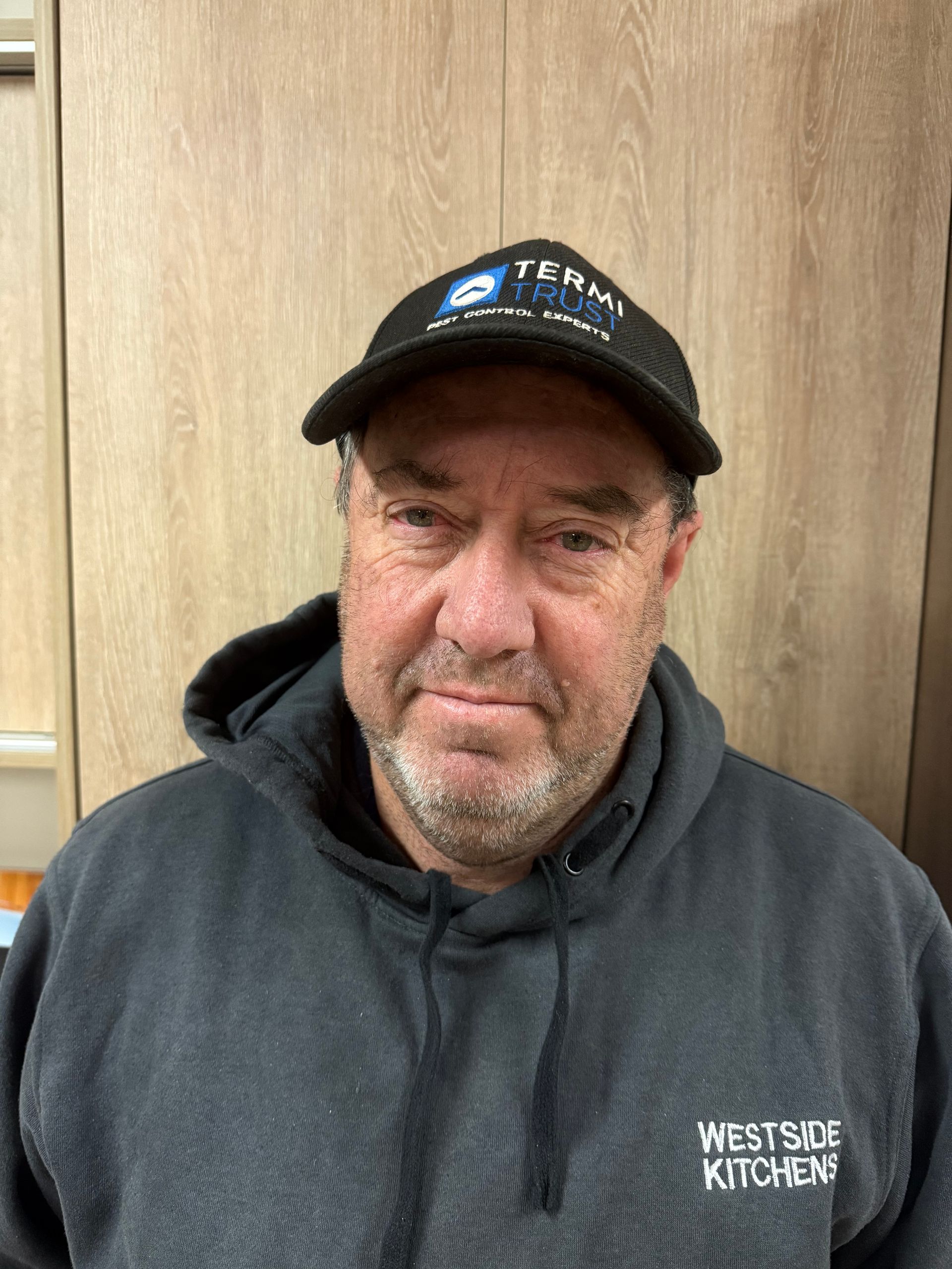 Tradesman using drill image