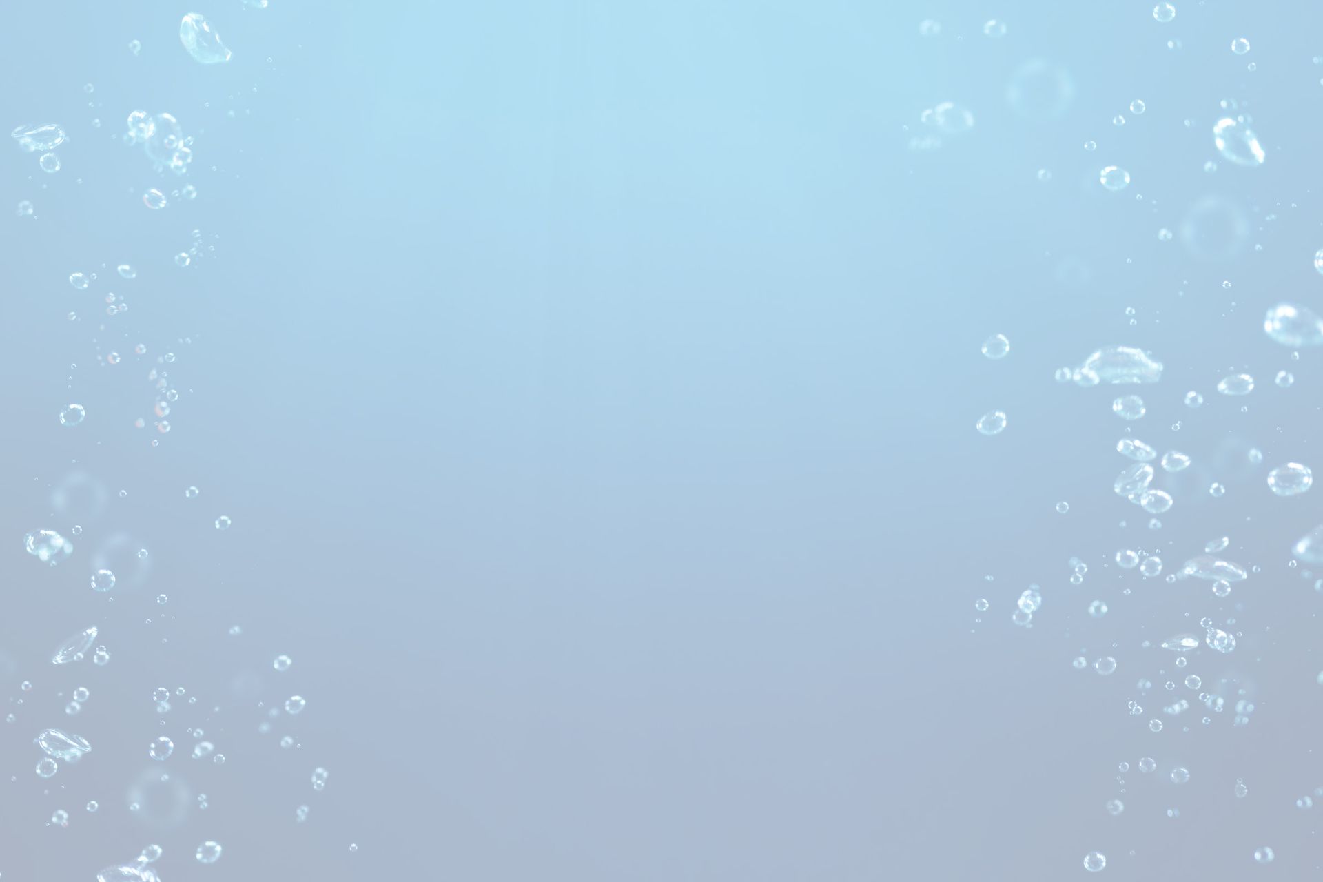 Bubbles are floating in the air on a blue background.