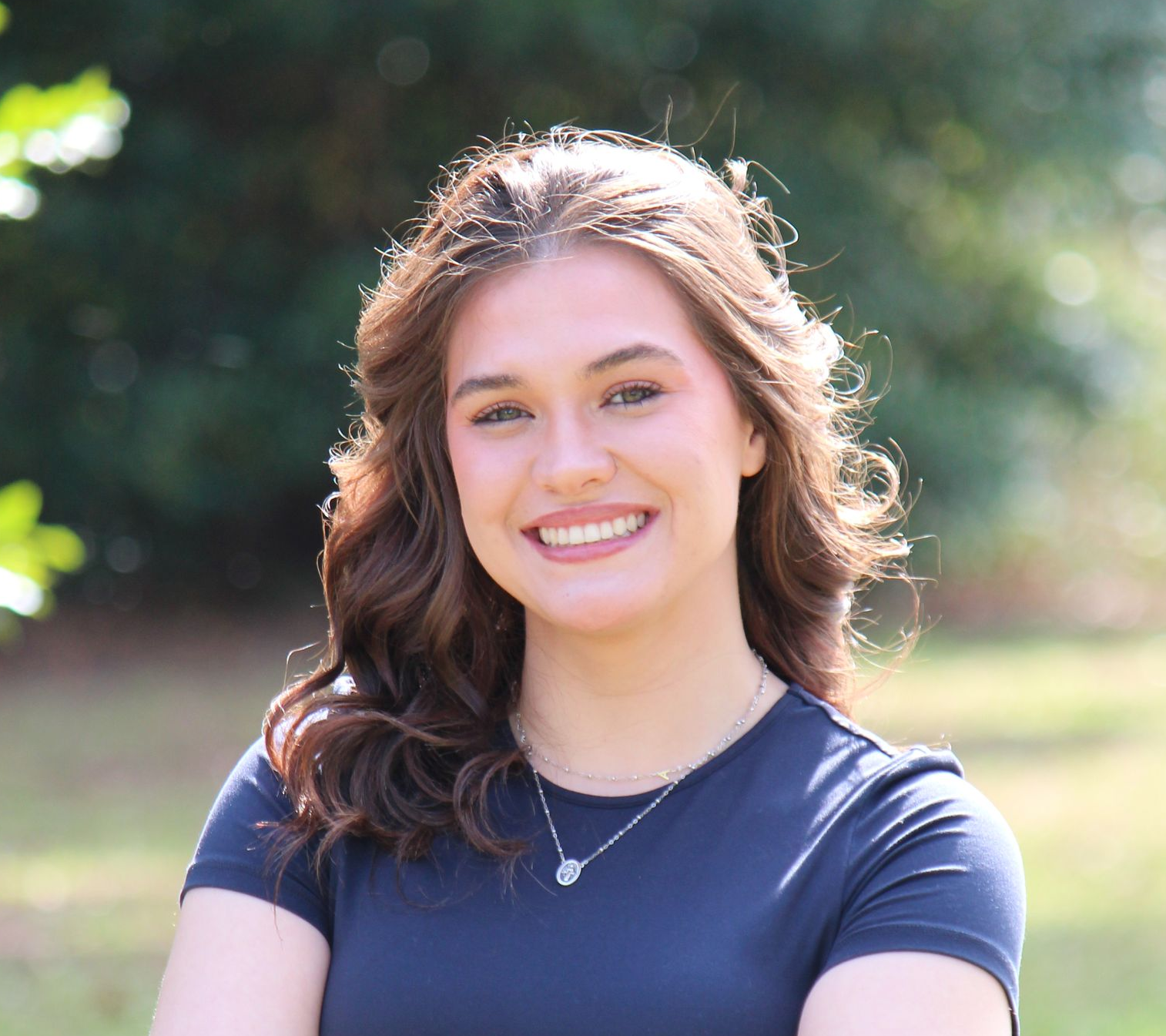 Image of an environmental consultant wearing a black shirt.