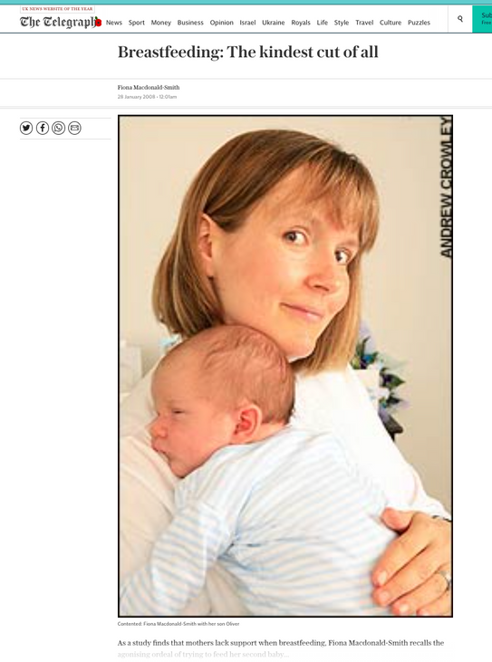 a woman is holding a baby in her arms 