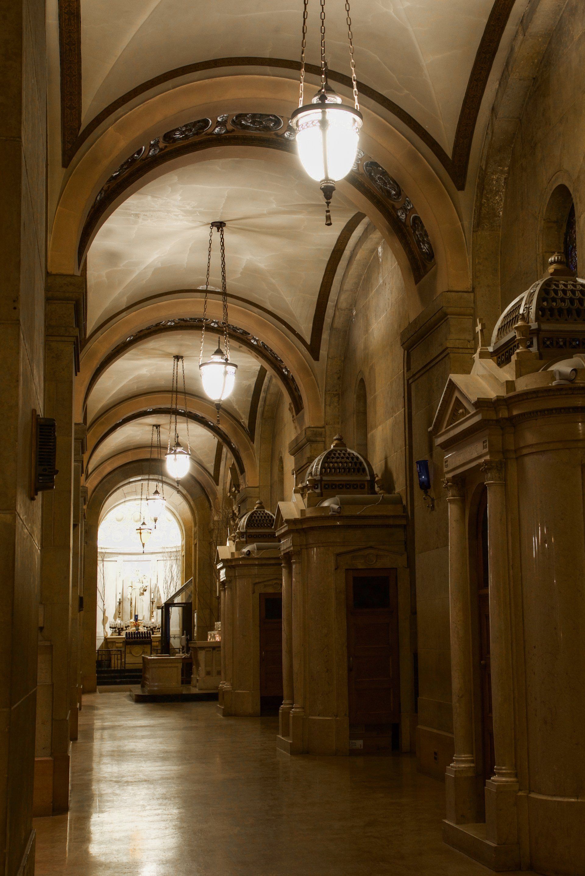 A hallway in a building with arched ceilings