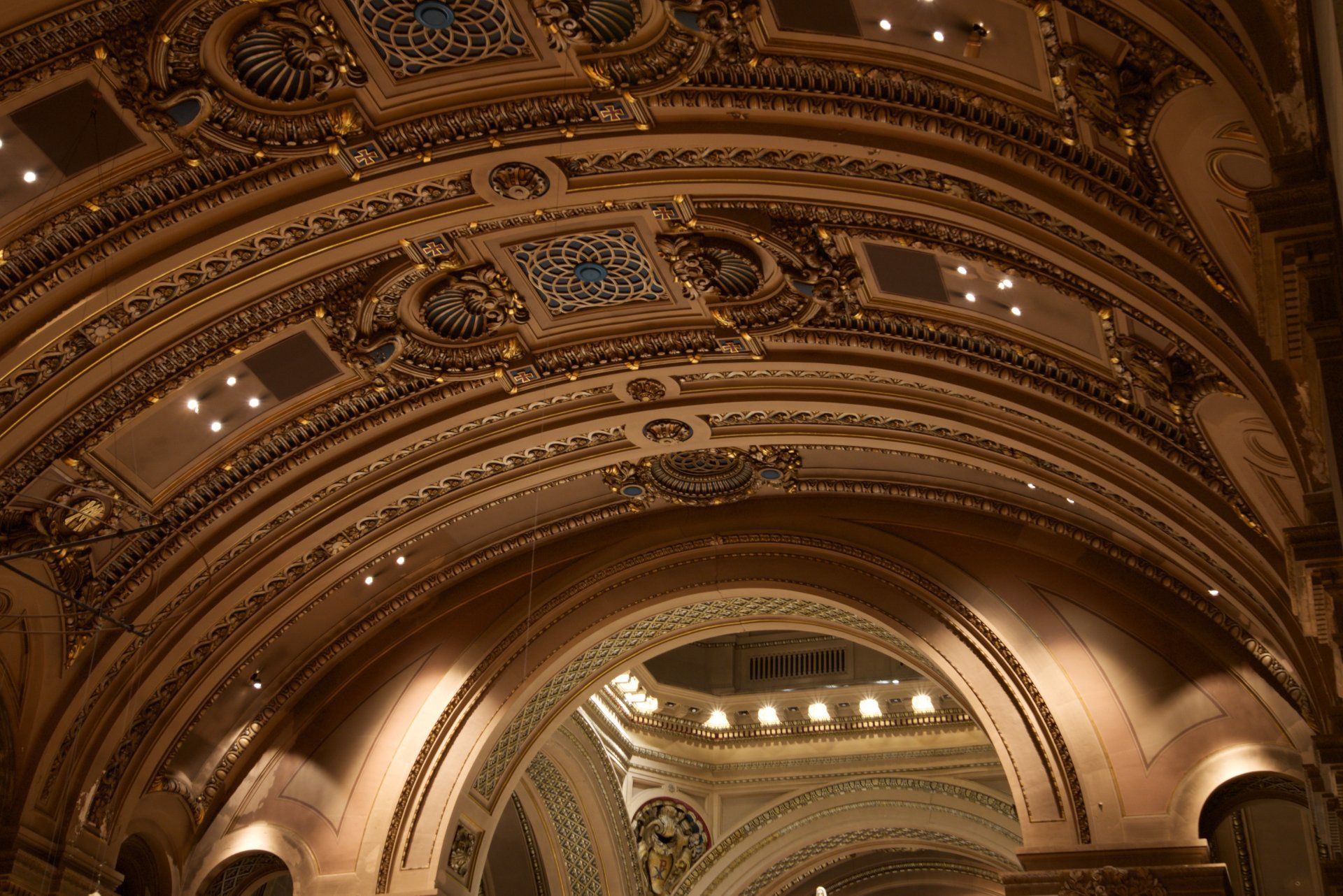 Looking up at the ceiling of an ornate building