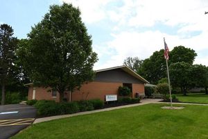 A brick building with a sign that says ' amanda ' on it