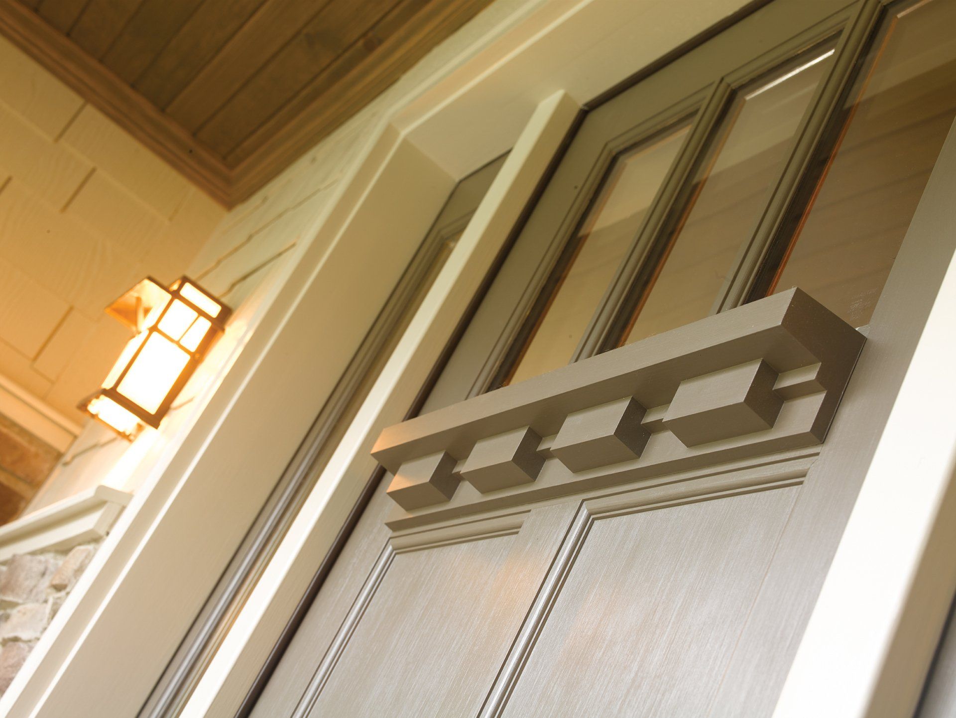 A close up of a door with the letter r on it