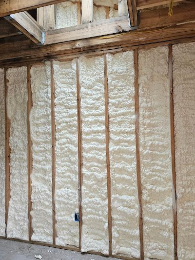 A room with a wall covered in foam insulation.