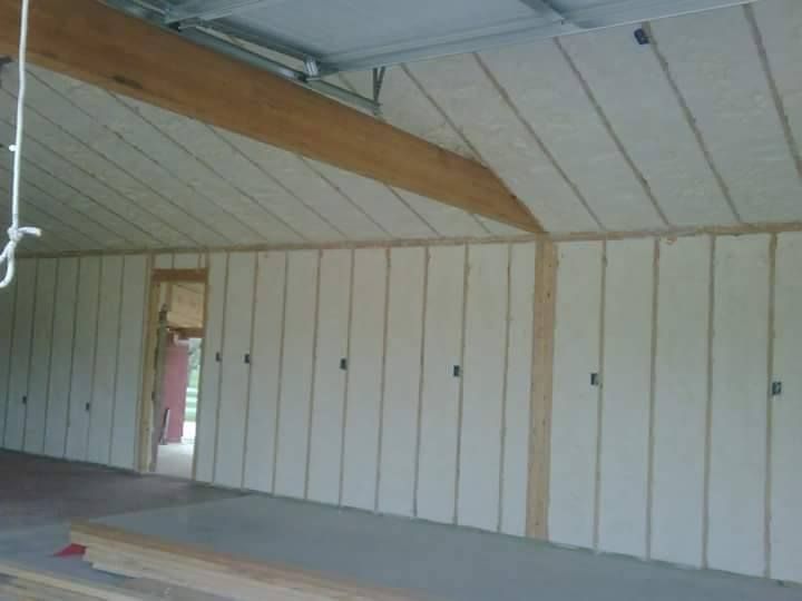 A room with a lot of white walls and a ceiling