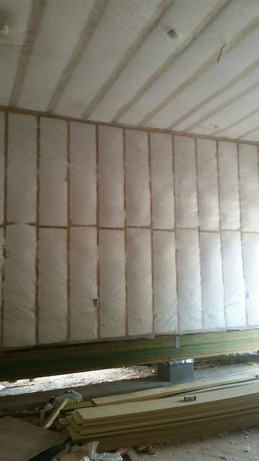 A room with a lot of insulation on the walls and ceiling.