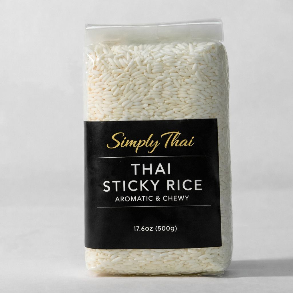 A clear bag of white Thai sticky rice with a black label reading 