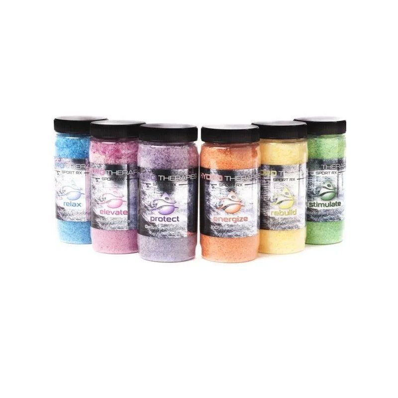 A group of six jars of bath salts in different flavors.