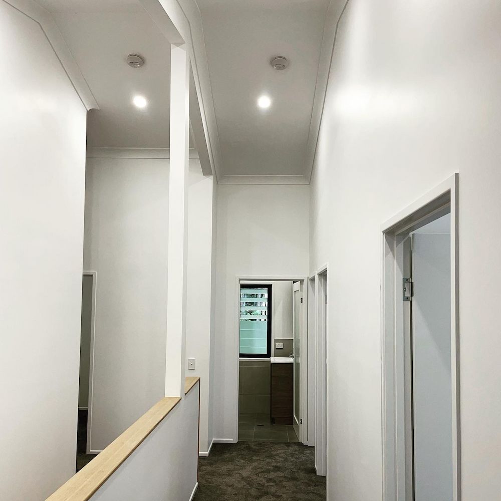 A White Hallway With Several Doorways — JGD Constructions in Lake Eacham, QLD