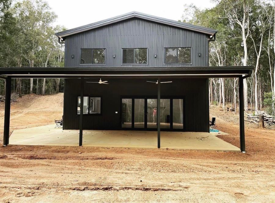 Two-story Black House With a Carport, in a Wooded Area — JGD Constructions in Atherton, QLD