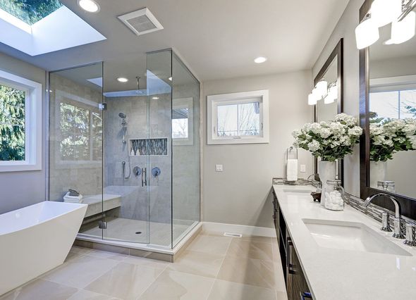 Modern bathroom featuring a glass shower Modern bathroom featuring a glass shower