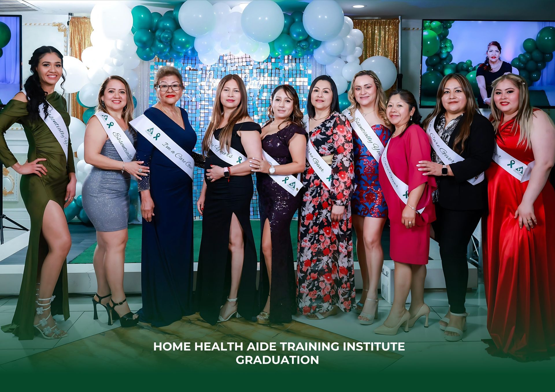 A group of women are posing for a picture at a graduation party.