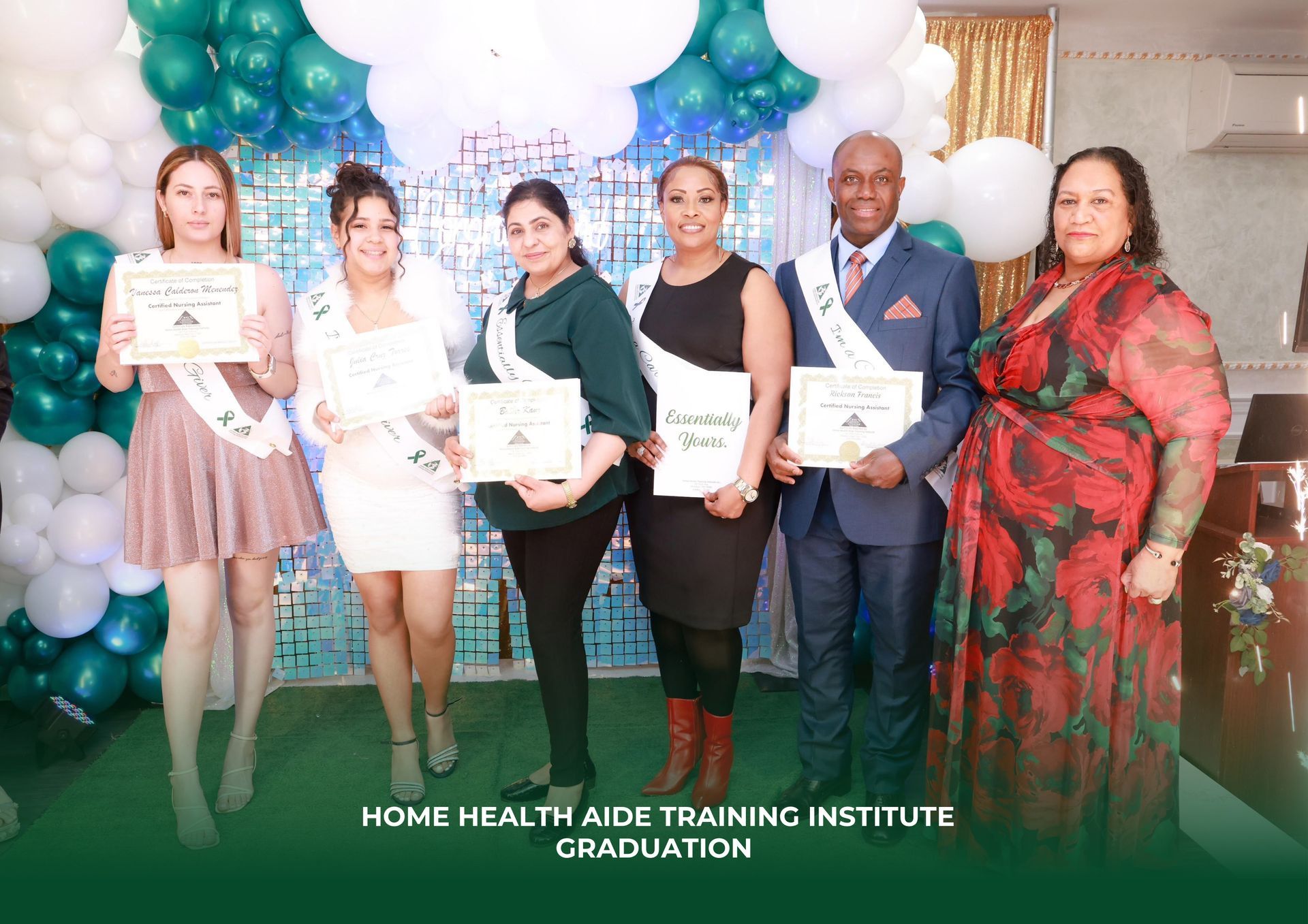 A group of people standing next to each other holding certificates.