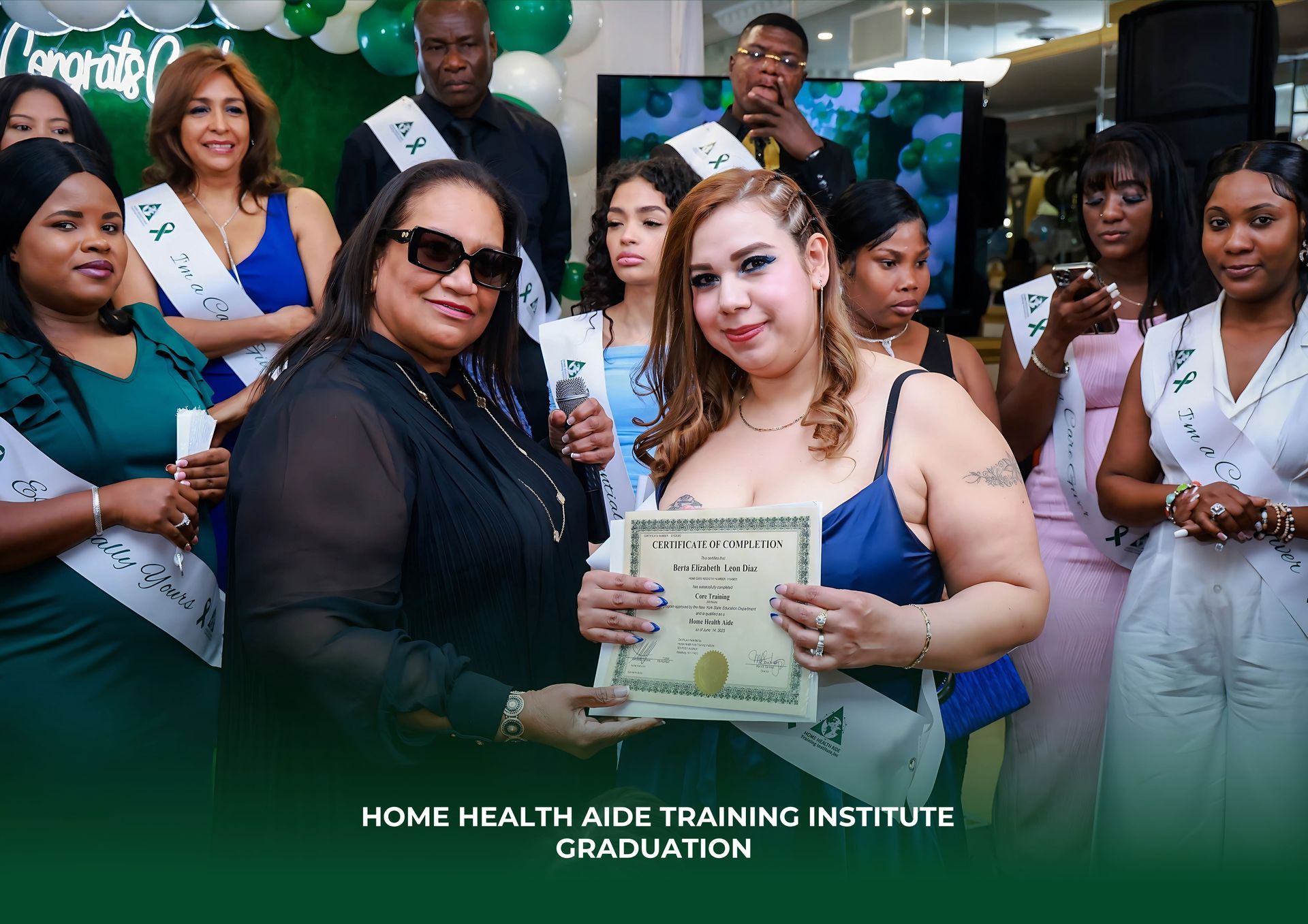 A group of women are standing around a woman holding a certificate.