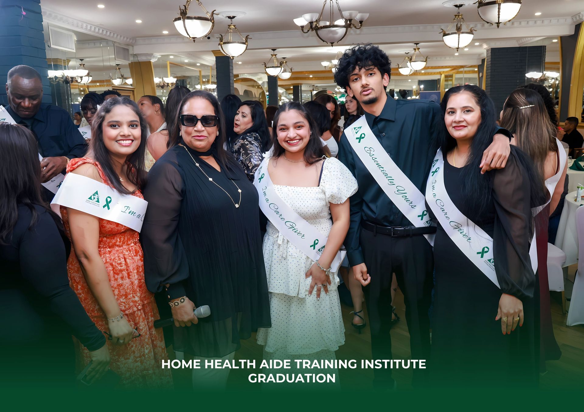 A group of people are posing for a picture at a graduation ceremony.