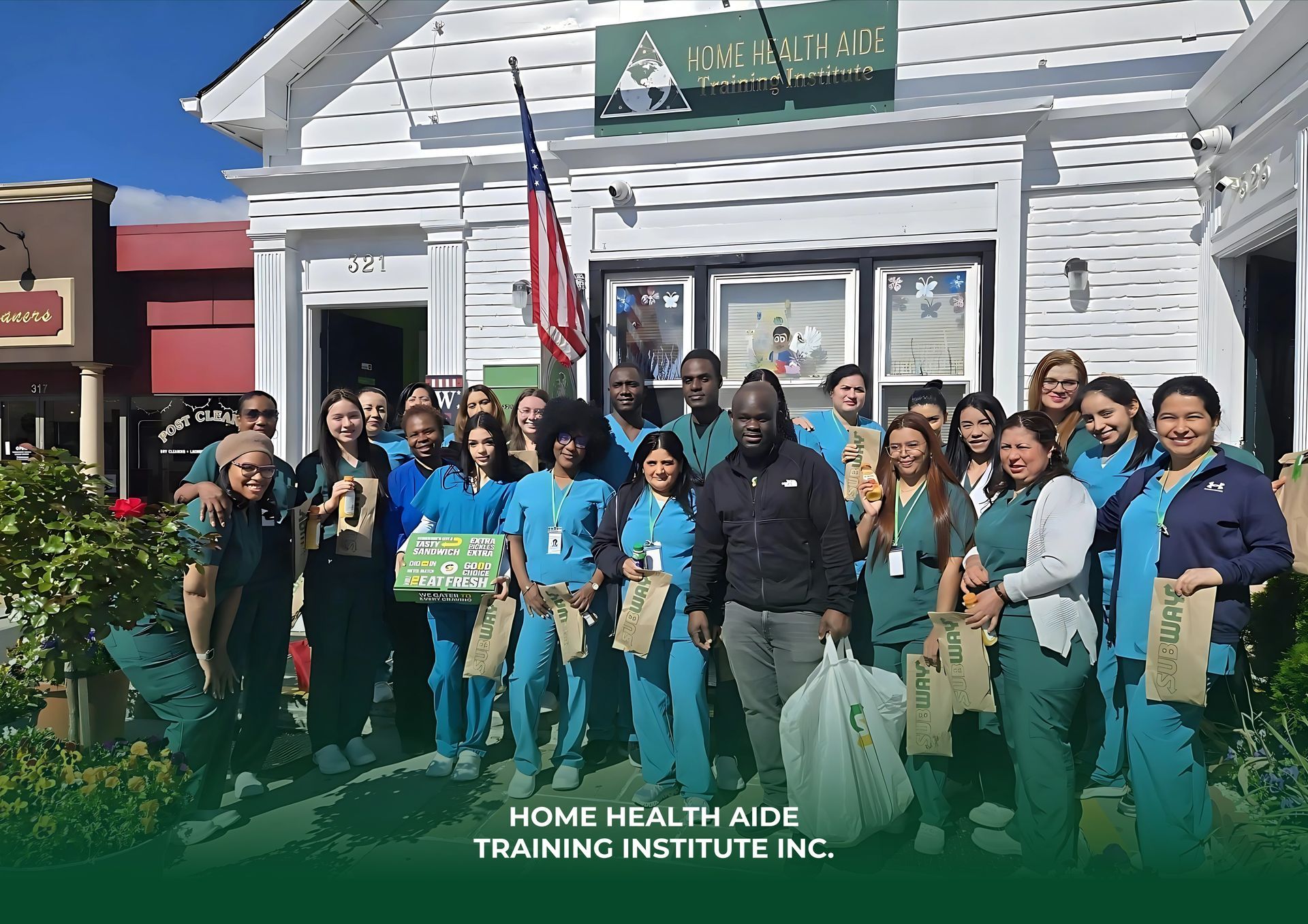 A group of people are posing for a picture in front of a building.