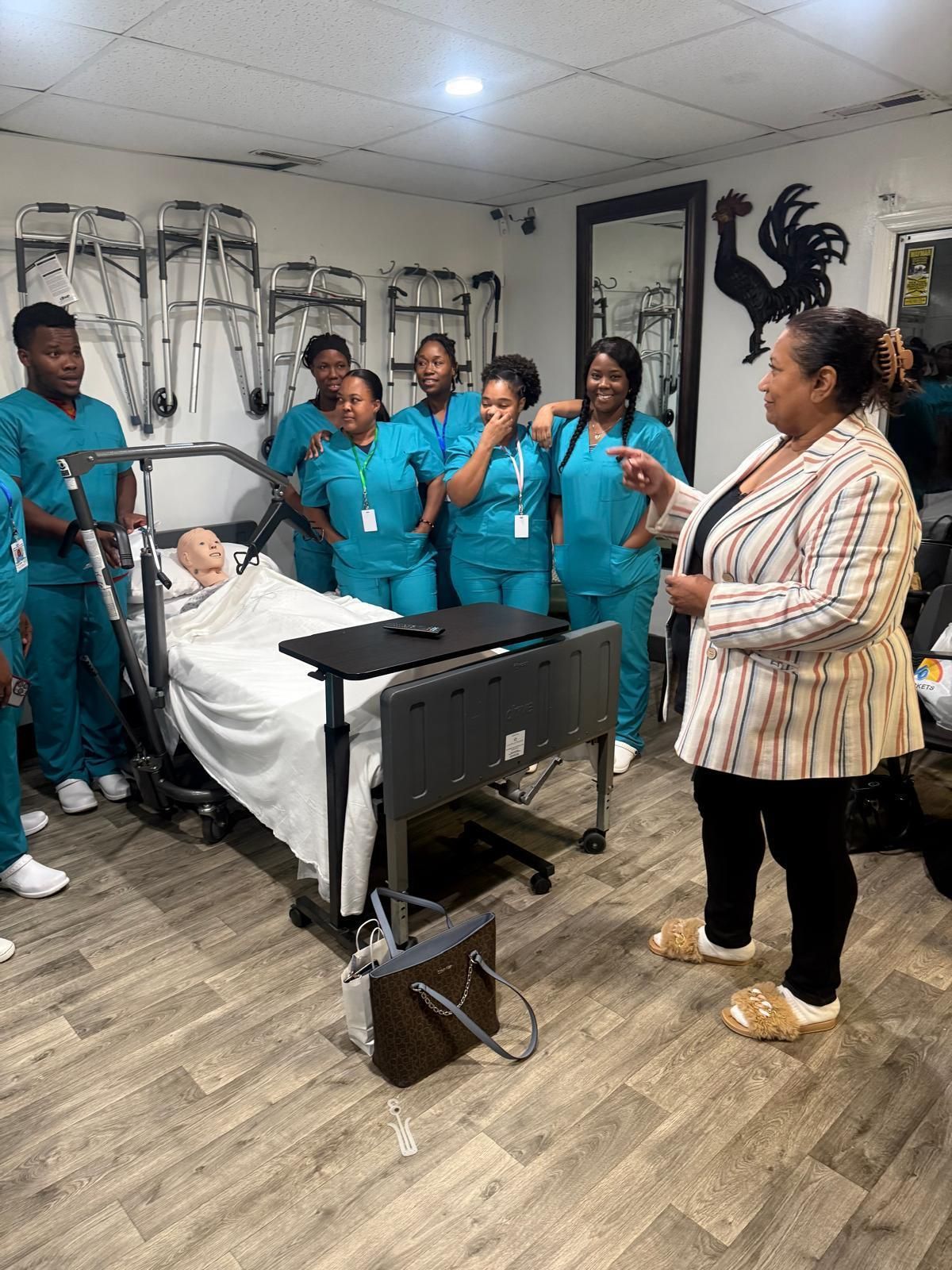 A woman in a black cape is clapping her hands at a party.