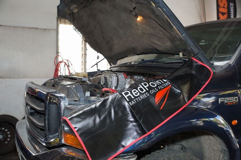 A Ford Truck With The Hood Up And A Redpoint Towel On It — CS Mechanical Repairs & Services In Wauchope, NSW
