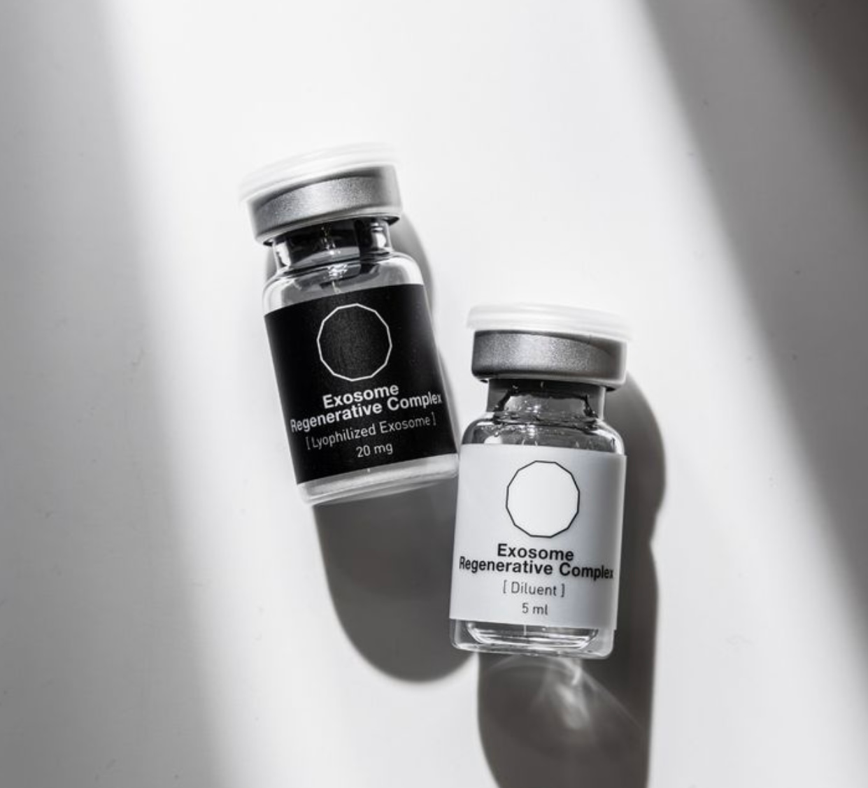 Two small vials labeled 