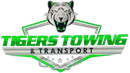Logo of Tigers Towing & Transport, Cypress Texas, featuring a green tow truck with a car and a tiger graphic.