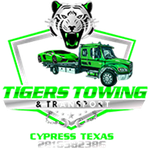 Tiger Towing logo: green tow truck hauling a sports car, tiger head, 