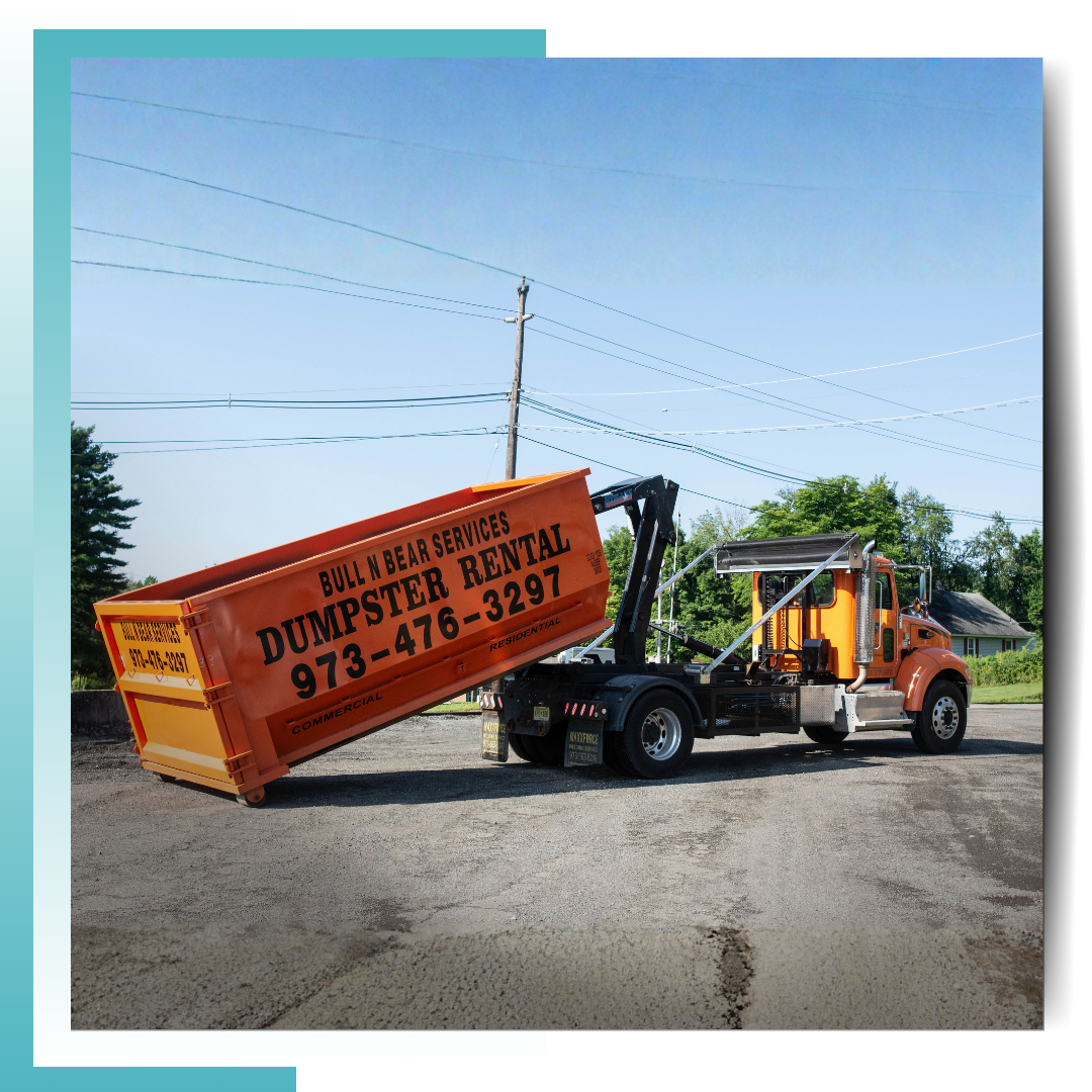 Bull N Bear Dumpster truck parked in the field