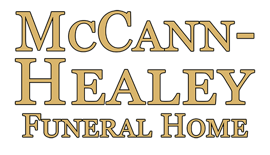 McCann-Healey Funeral Home logo: Gold text on a white background. "McCann-Healey" is above "Funeral Home".
