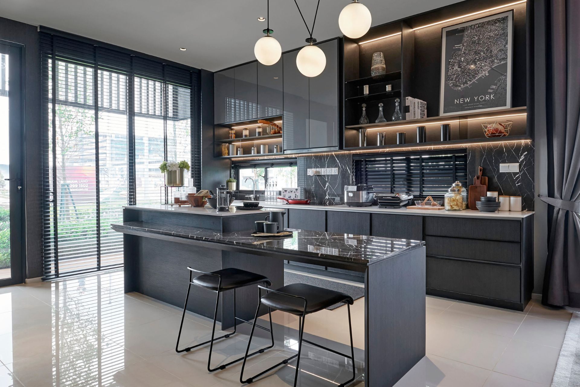 Sleek, modern kitchen with marble island and elegant lighting in Athens, GA.