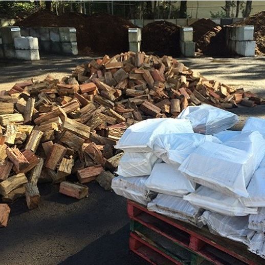 A Pile Of Chopped Wood Is Stacked On Top Of Each Other — Serious About Landscape Supplies In West Gosford, NSW