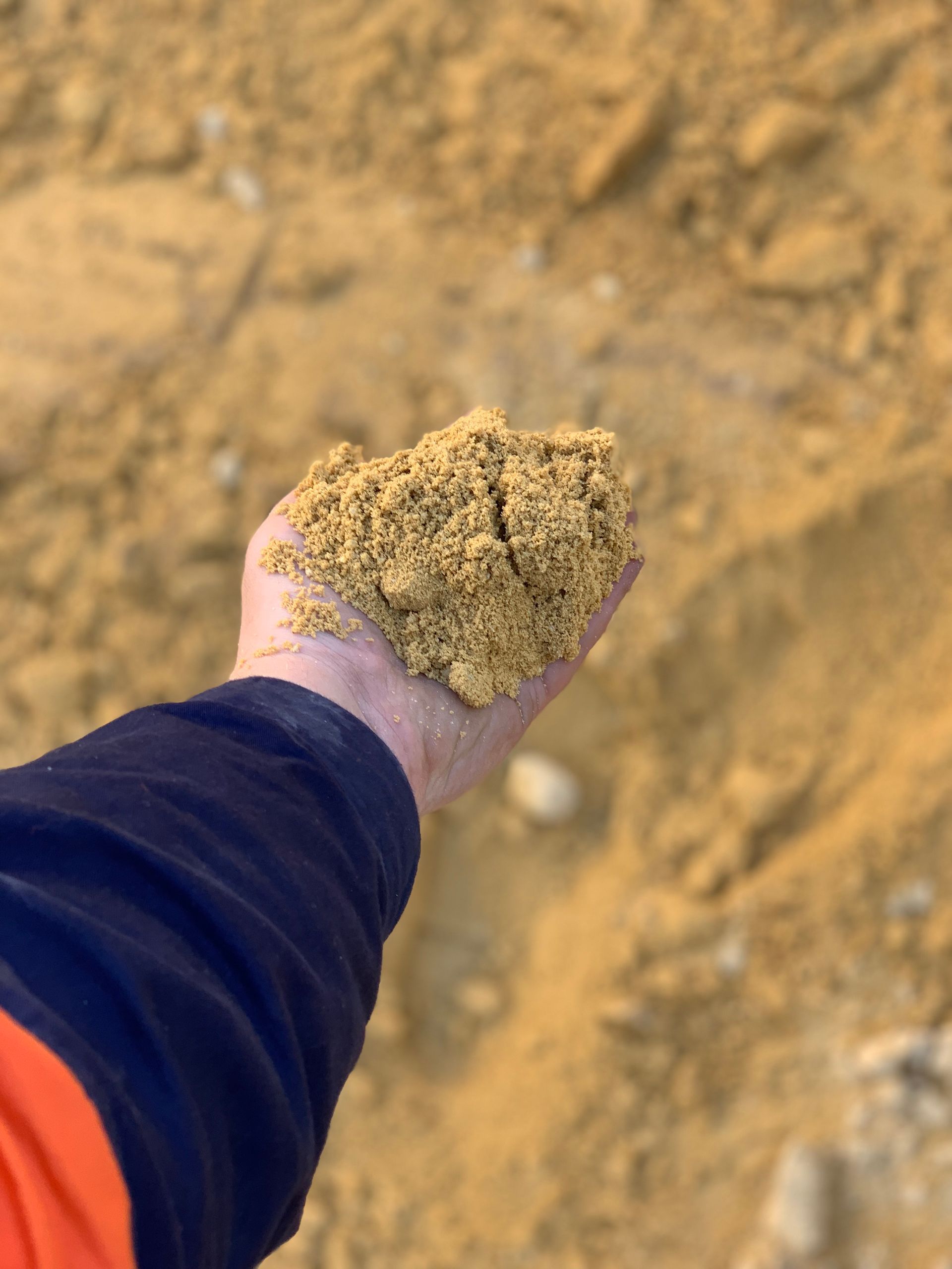 A Close Up Of A Pile Of Brown Sand — Serious About Landscape Supplies In West Gosford, NSW