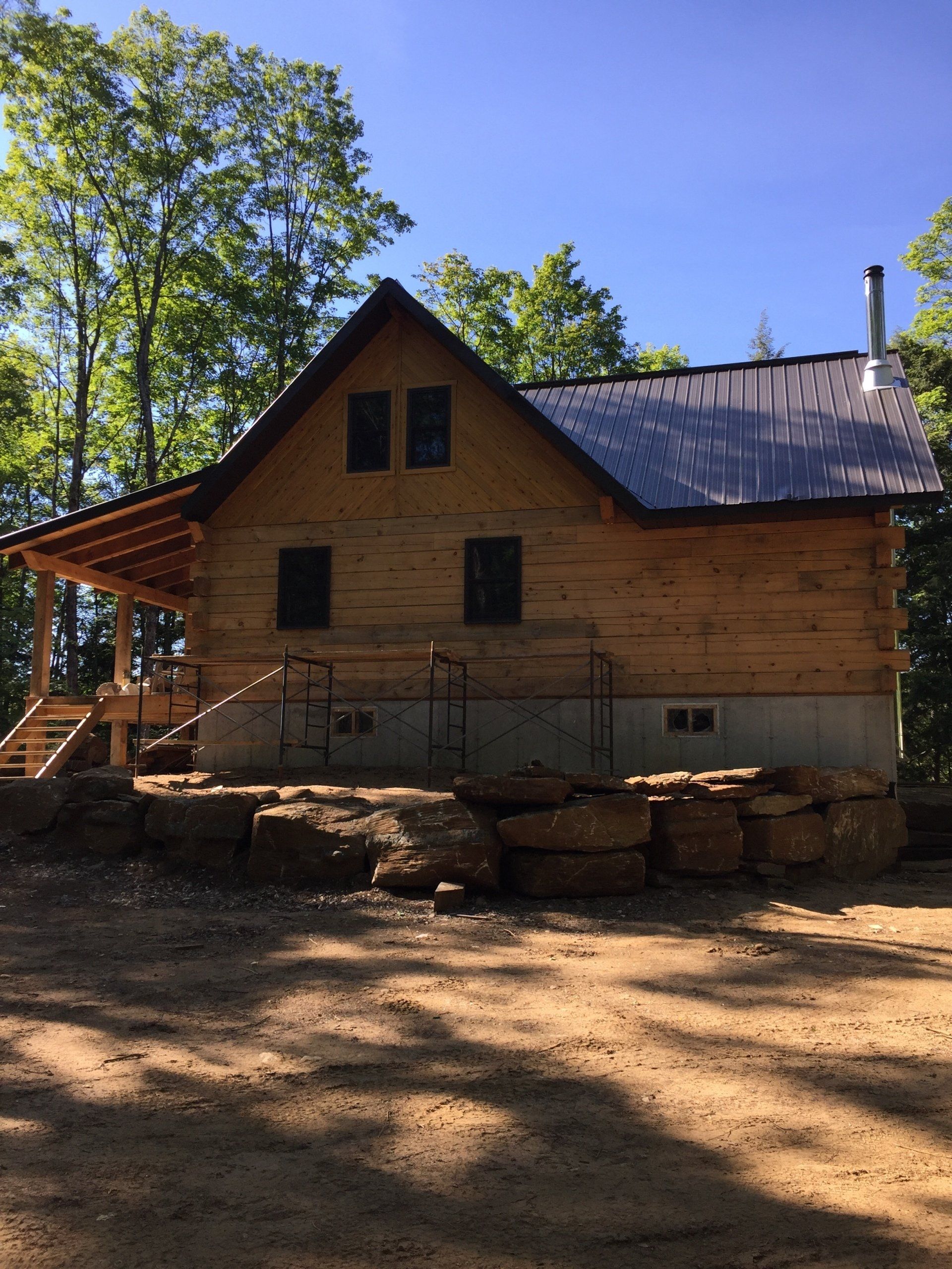 large beige timber cottage