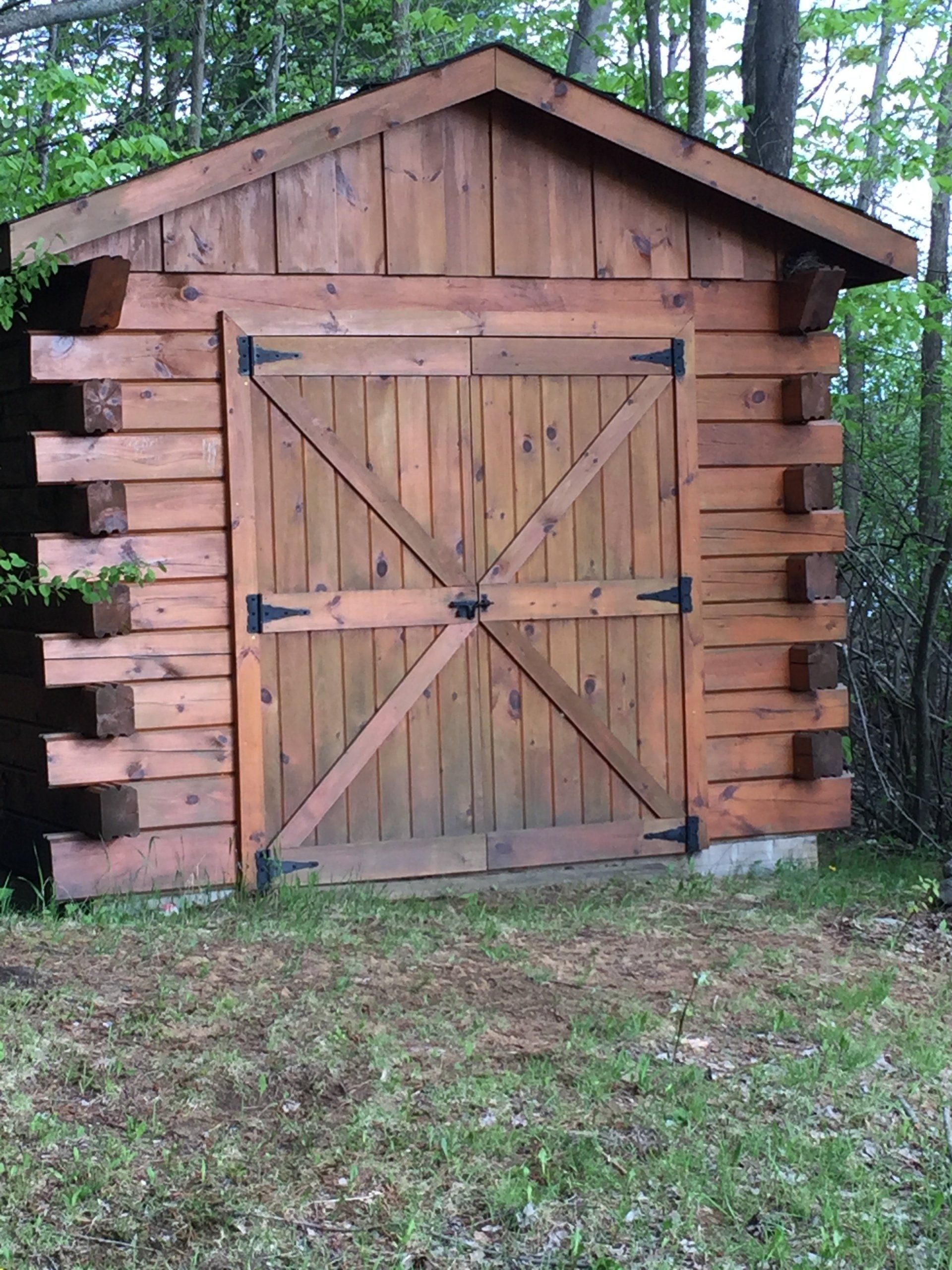 varnished timber shed
