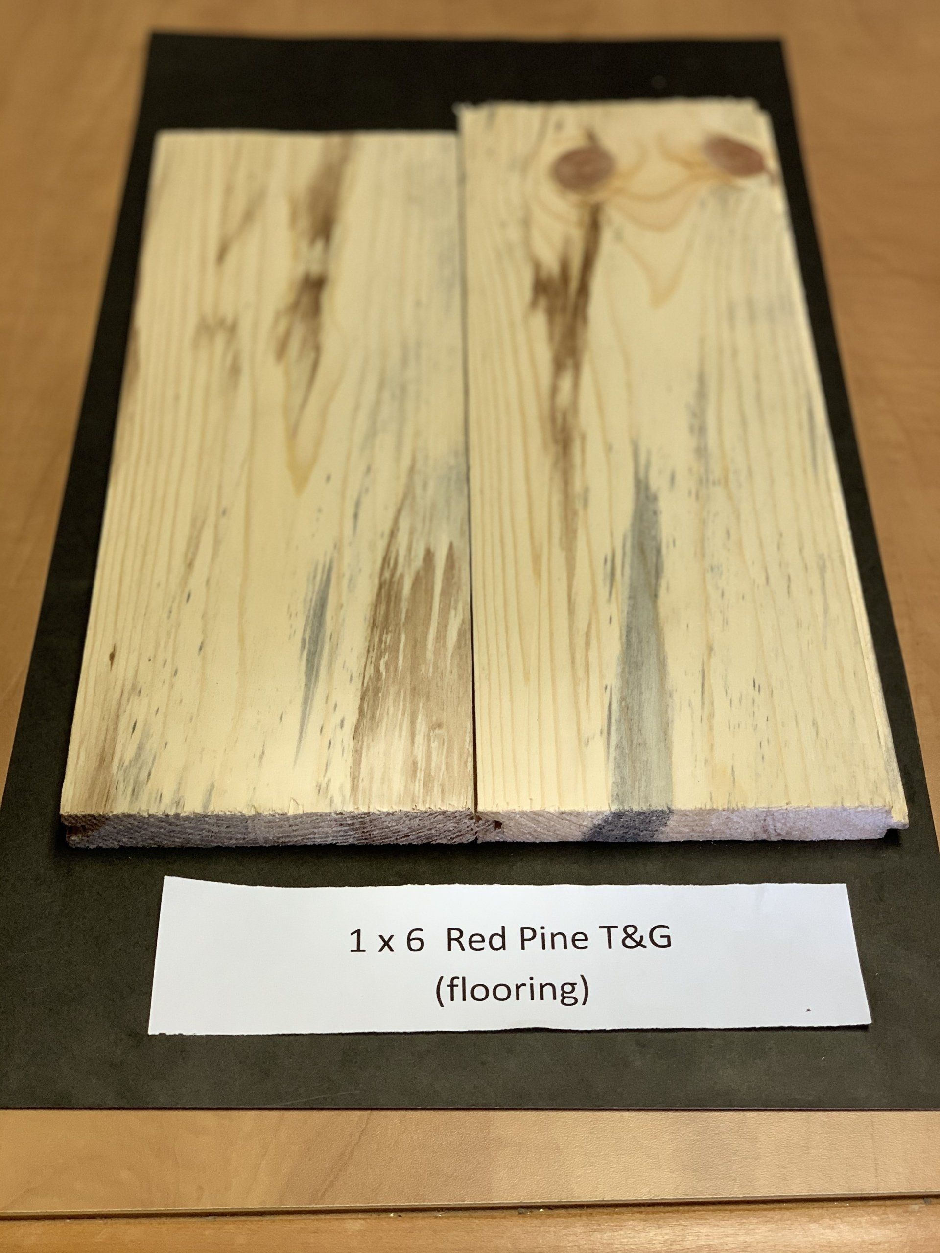 close up of beige pine wood siding slabs for house