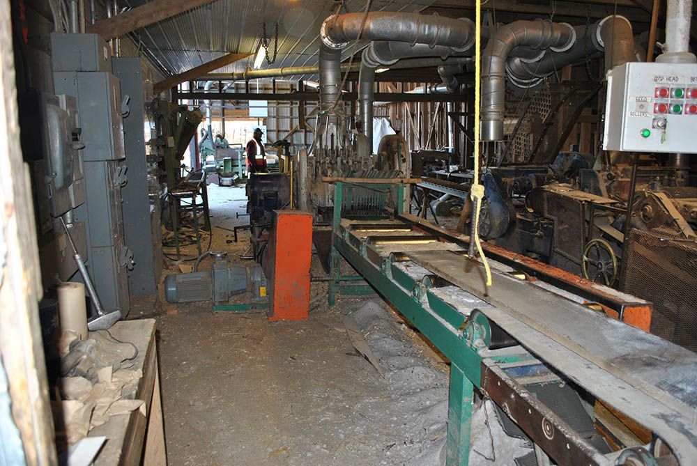 wood cutting warehouse filled with machinery