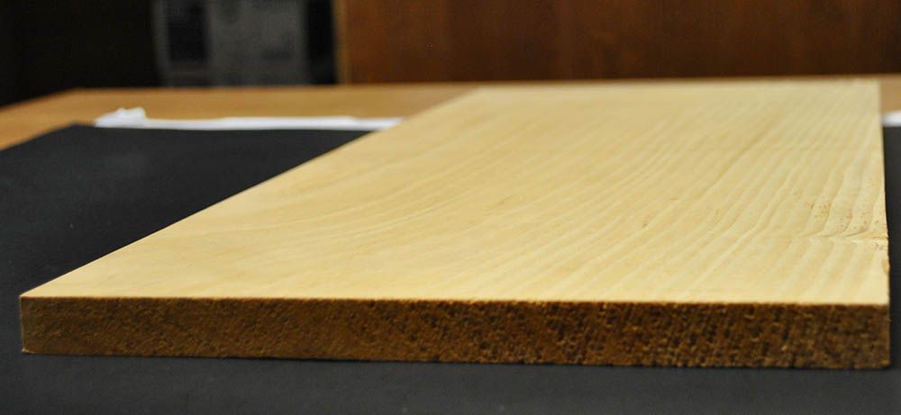 large plank of beige pine wood